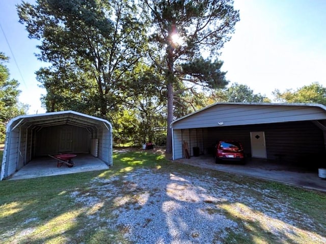 exterior space with a yard and a carport