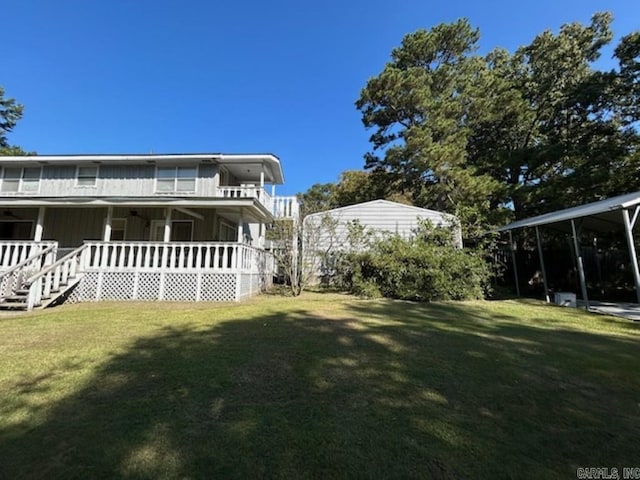 exterior space featuring a carport and a balcony