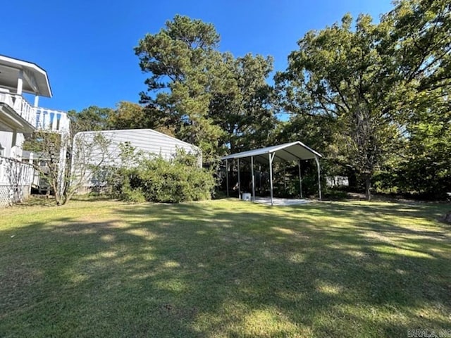 view of yard with a carport