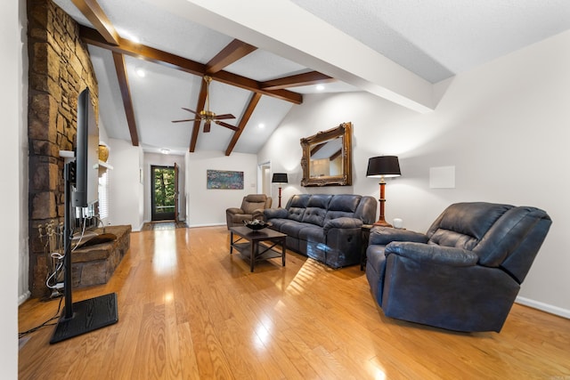 living room with vaulted ceiling with beams, wood-type flooring, and ceiling fan