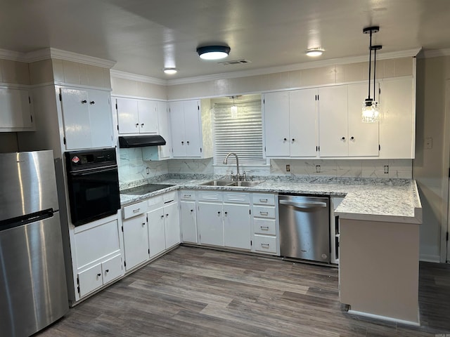 kitchen with dark hardwood / wood-style floors, hanging light fixtures, sink, black appliances, and white cabinets