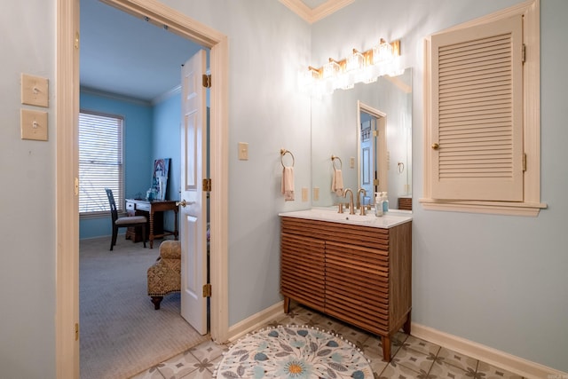 bathroom with vanity and crown molding