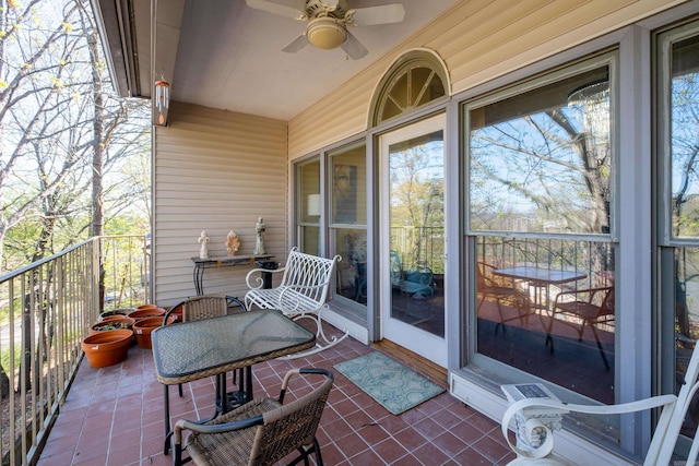 balcony featuring ceiling fan