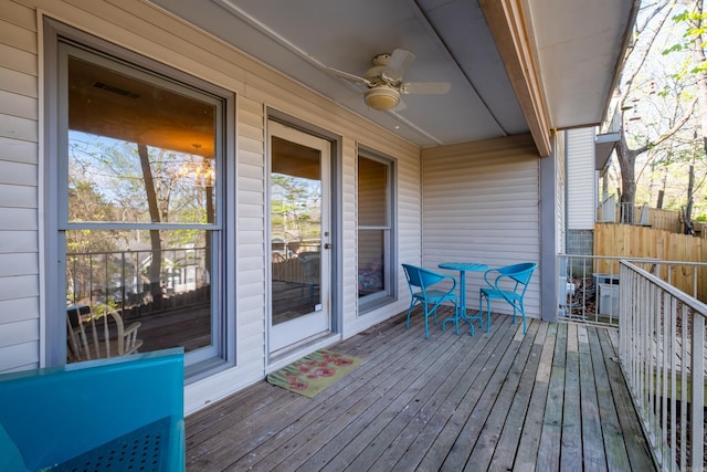 wooden terrace with ceiling fan