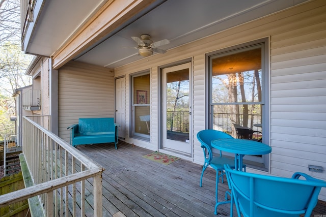 wooden deck with ceiling fan