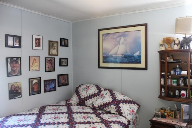 bedroom with crown molding