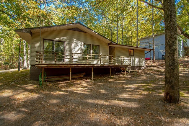 exterior space featuring a wooden deck