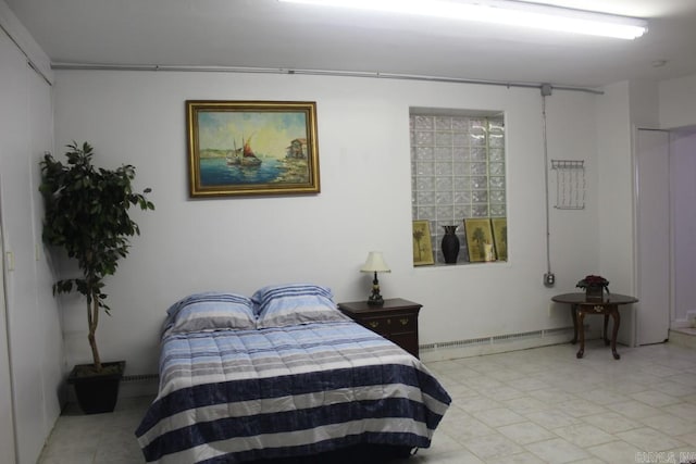 bedroom featuring baseboard heating