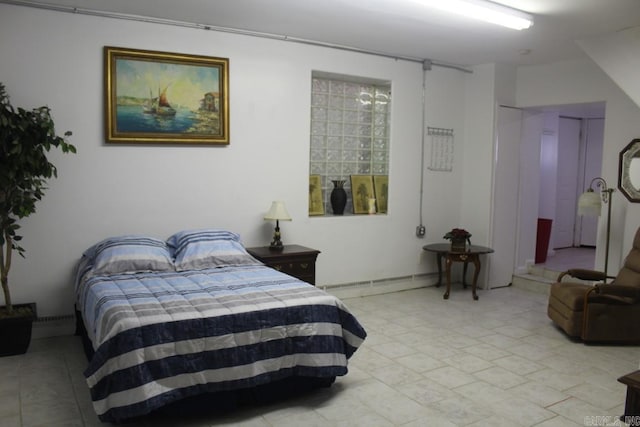 bedroom with a baseboard radiator