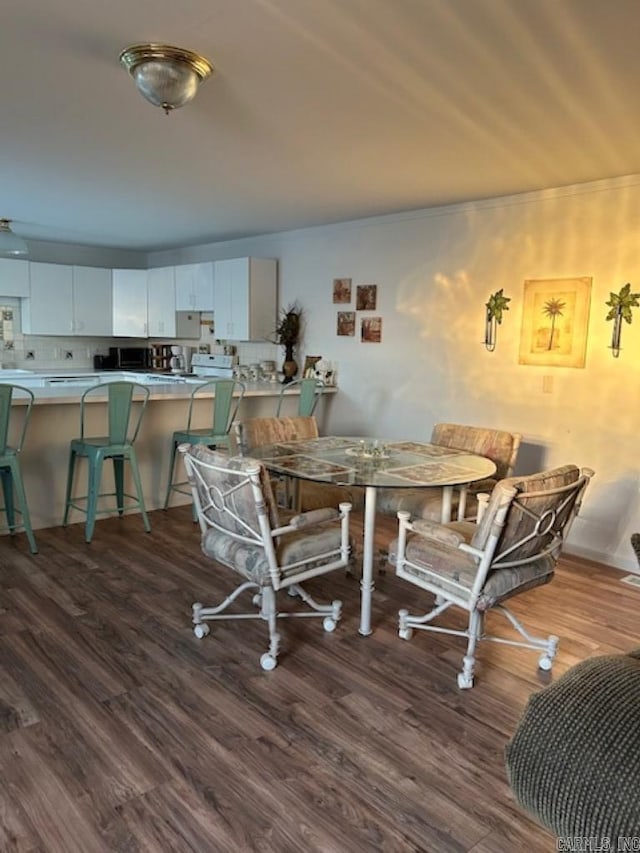 dining room featuring hardwood / wood-style floors