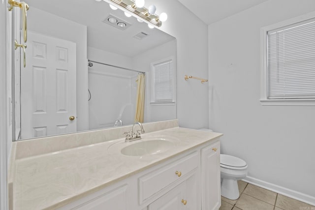 bathroom with toilet, a shower with curtain, vanity, and tile patterned floors