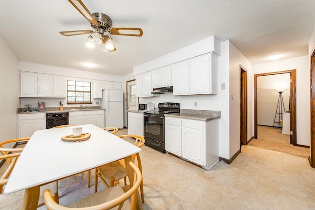 kitchen featuring white cabinetry, ceiling fan, black appliances, and a textured ceiling