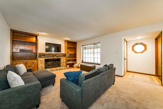 carpeted living room with a textured ceiling and a fireplace