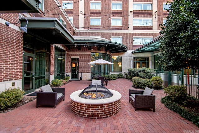 view of patio / terrace with an outdoor fire pit