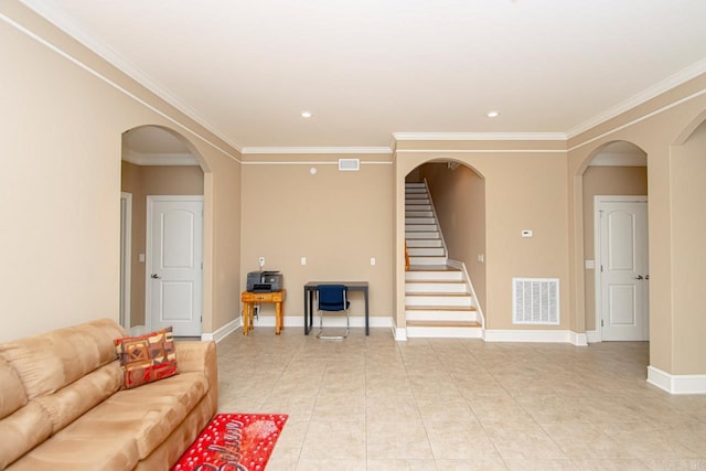 living room featuring ornamental molding and light tile patterned floors