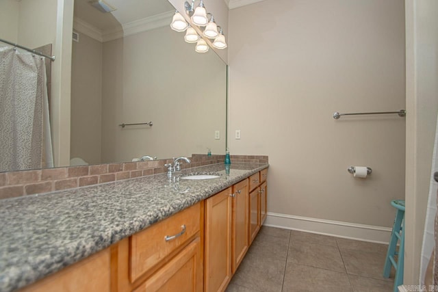 bathroom featuring vanity, crown molding, and tile patterned floors