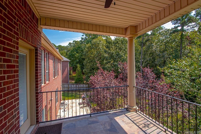 view of patio featuring a balcony and ceiling fan