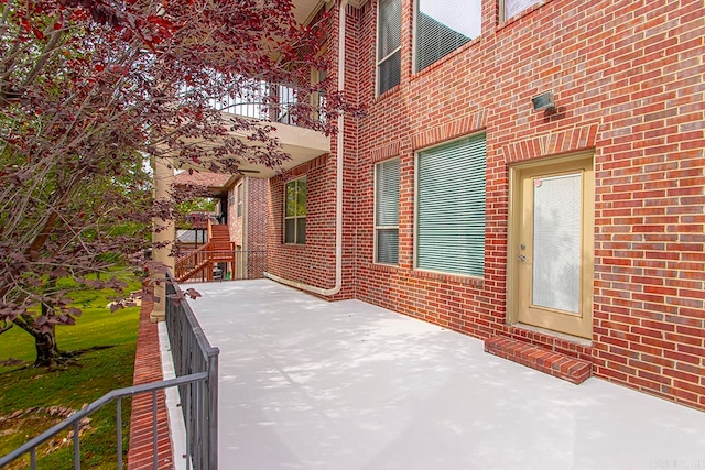 view of patio / terrace featuring a balcony