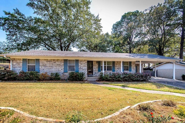 ranch-style house with a carport, a front yard, and a garage