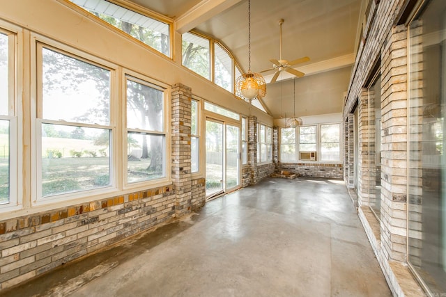 unfurnished sunroom with vaulted ceiling with beams and ceiling fan