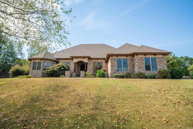 view of front of property with a front lawn