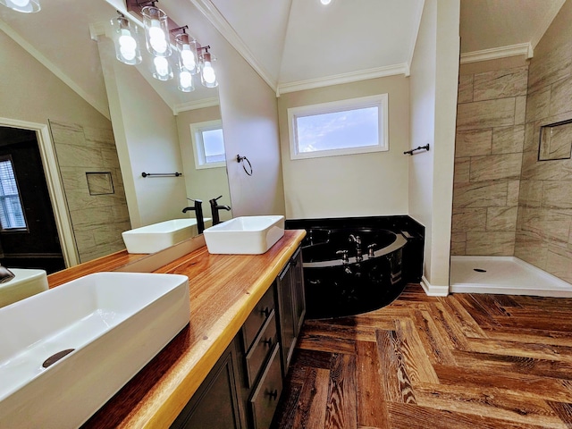 full bathroom with lofted ceiling, a sink, and crown molding