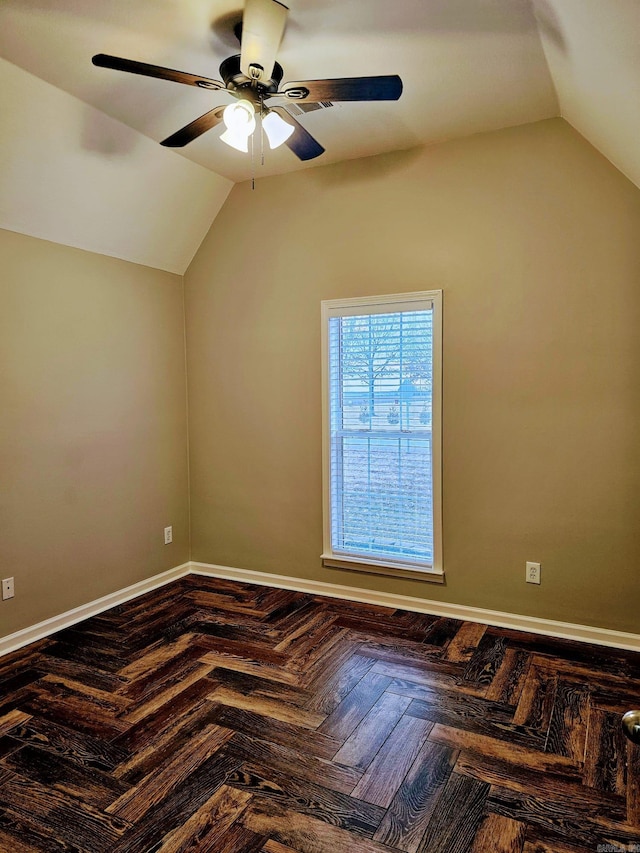 bonus room with a ceiling fan, lofted ceiling, and baseboards