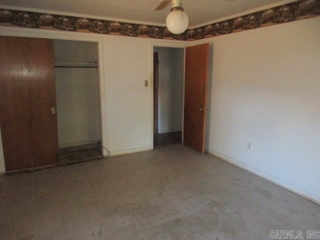 unfurnished bedroom featuring a closet