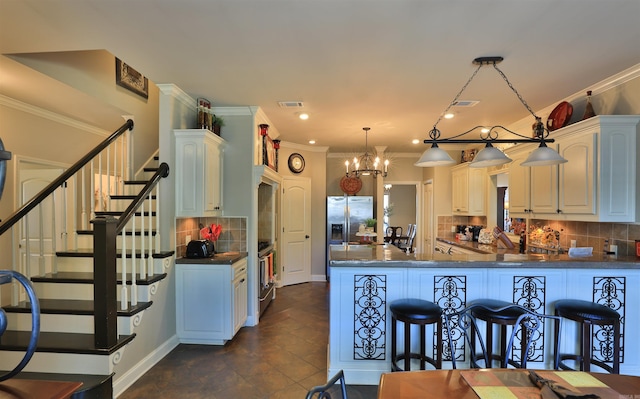 kitchen featuring backsplash, dark countertops, visible vents, stainless steel refrigerator with ice dispenser, and crown molding