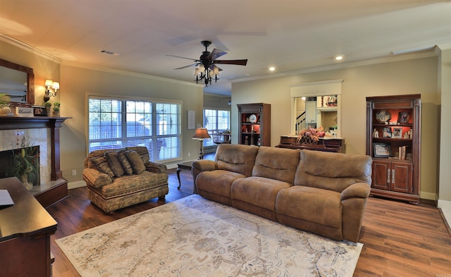 living room with crown molding and dark hardwood / wood-style flooring