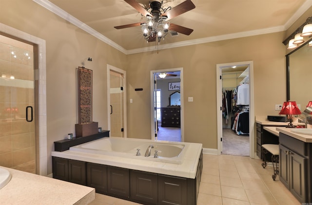 bathroom featuring vanity, crown molding, tile patterned flooring, and an enclosed shower