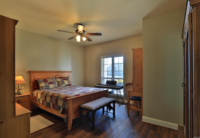 bedroom with dark wood-type flooring and ceiling fan