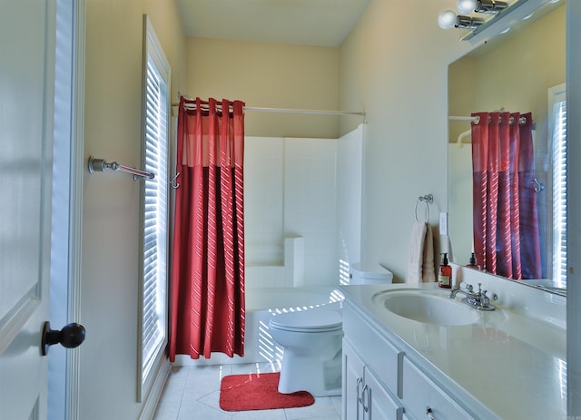 full bathroom featuring toilet, shower / bathtub combination with curtain, and a wealth of natural light