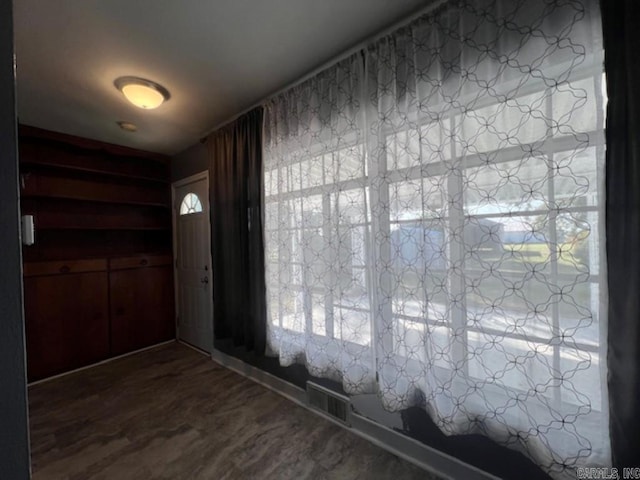 foyer with hardwood / wood-style floors