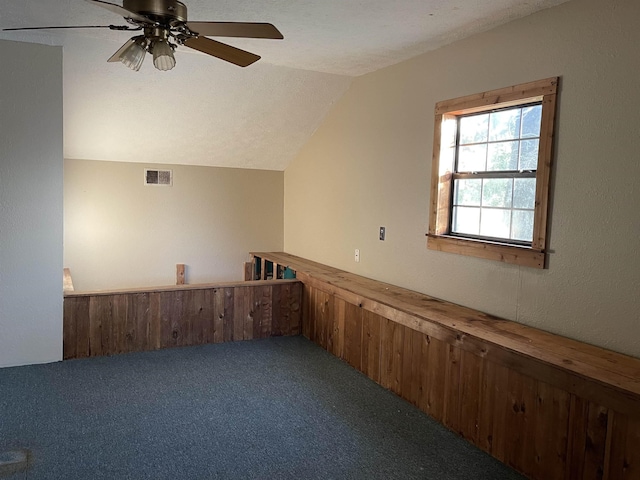 203 Mcclamrock, Portia, AR 72457 - carpeted empty room featuring ceiling fan, lofted ceiling, and visible vents
