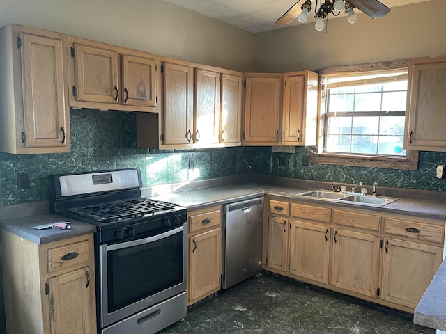 203 Mcclamrock, Portia, AR 72457 - kitchen featuring dark floors, stainless steel appliances, a sink, tasteful backsplash, and ceiling fan