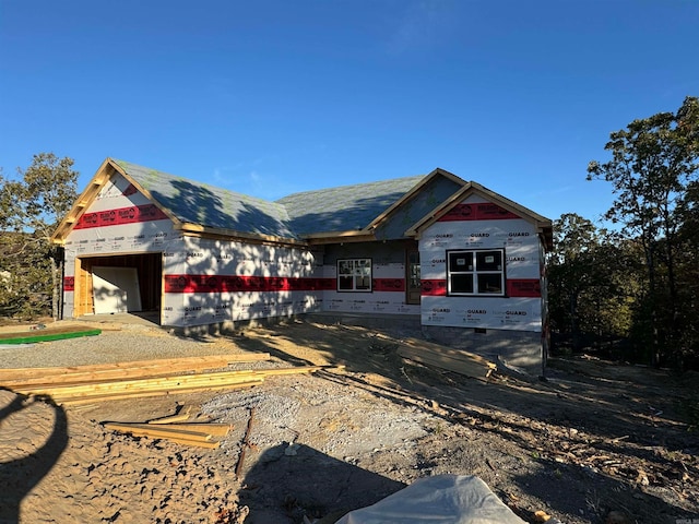 property in mid-construction featuring a garage