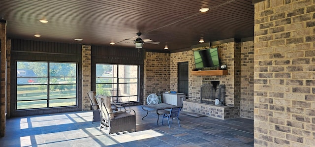 view of patio / terrace featuring ceiling fan