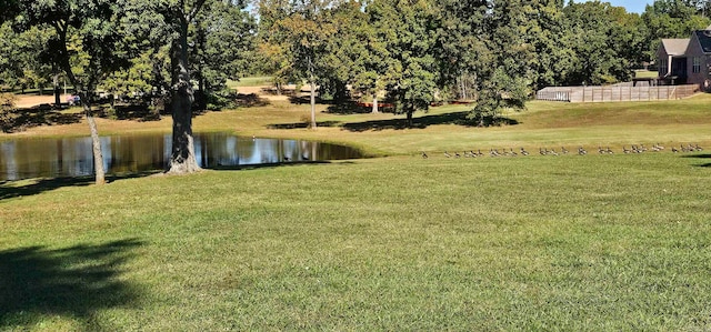 view of yard with a water view