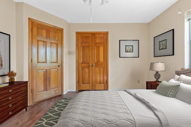 bedroom with wood-type flooring