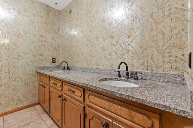 bathroom with vanity and tile patterned flooring