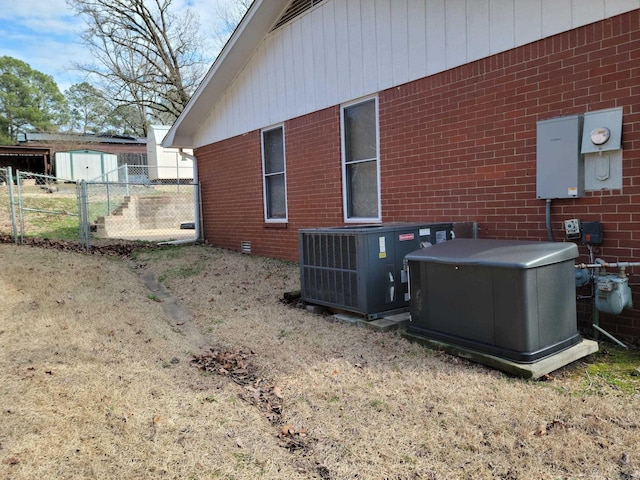 view of home's exterior featuring central AC