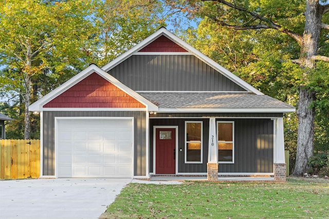 view of front of home featuring covered porch and a front yard