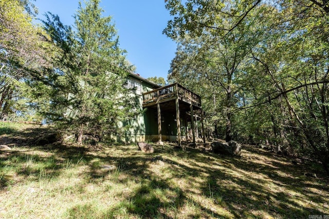 view of yard with a deck