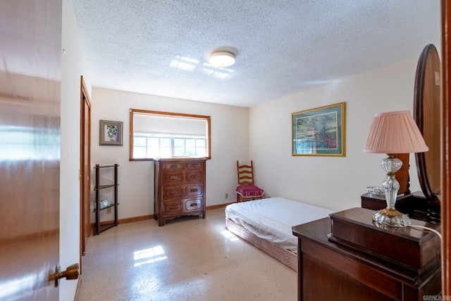 bedroom featuring a textured ceiling