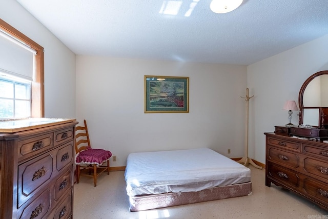 bedroom with a textured ceiling