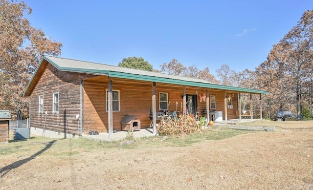 view of front of property featuring covered porch