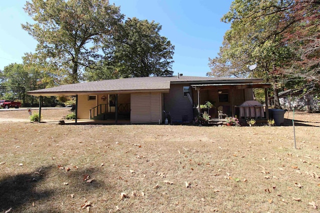 exterior space featuring a carport