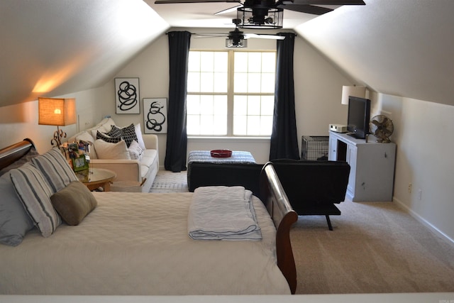 bedroom with light colored carpet and vaulted ceiling