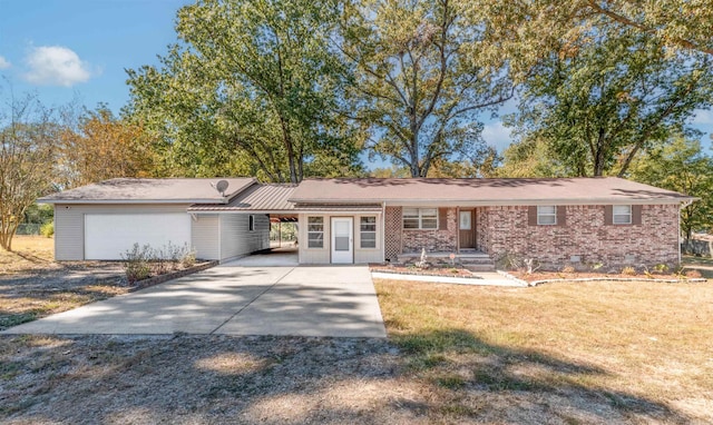 ranch-style home with a front yard and a carport